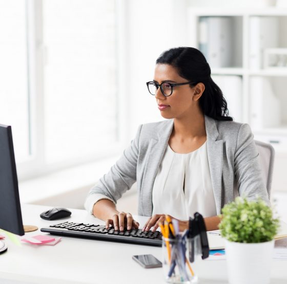businesswoman with computer working at office