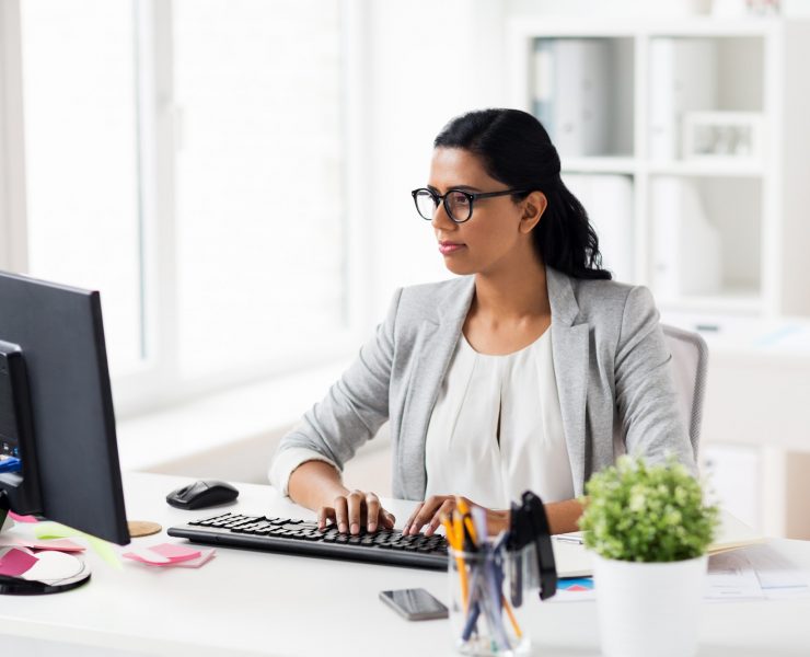 businesswoman with computer working at office